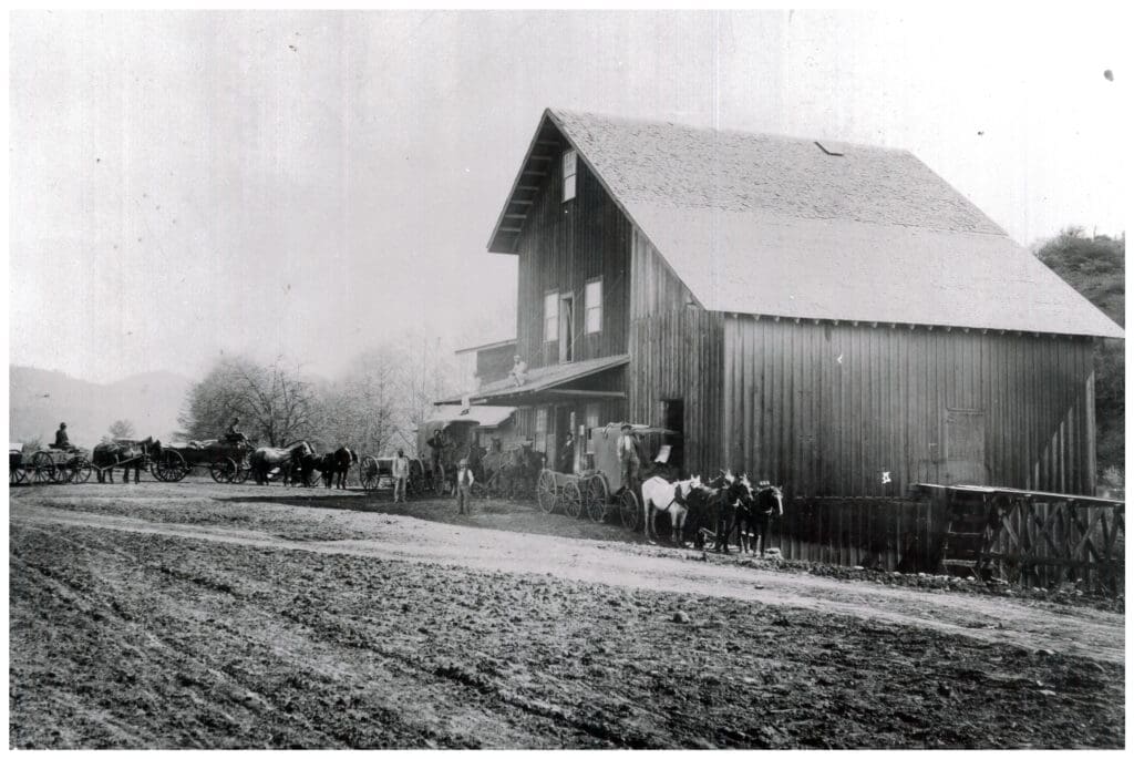 1890 Wagons Unloading Grain with Country Store Addition